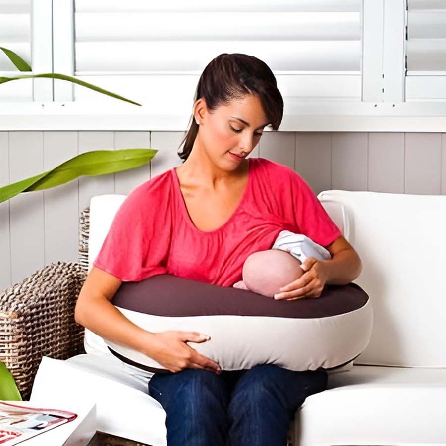 Milkbar Twin Portable Nursing Pillow mum feeding baby in football hold