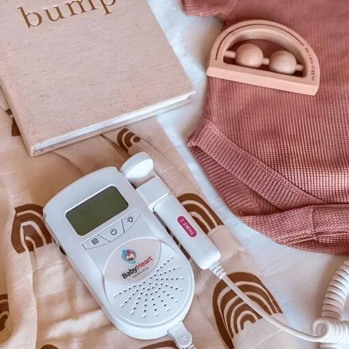 babyheart standard fetal doppler with baby items around it