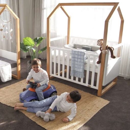 kaylula mila cot in a bedroom