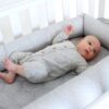 original breathe eze cosy crib with baby in a cot