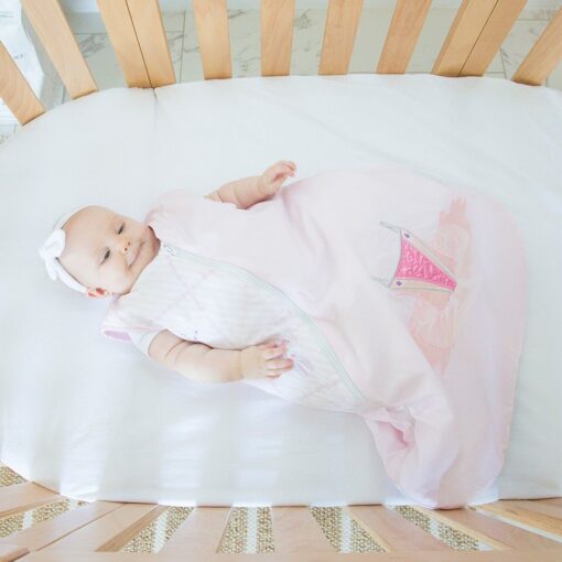 baby in cot wearing amani bebe princess sleeping bag