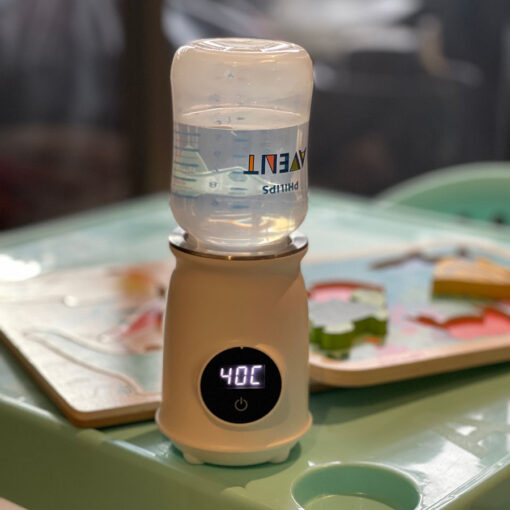 jiffi portable bottle warmer on play table