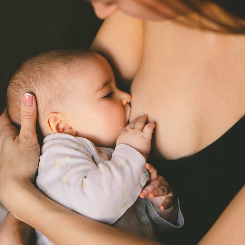mum breastfeeding baby