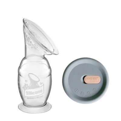 haakaa silicone breast pump with top view of cap